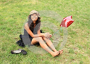 Smiling girl with balloon