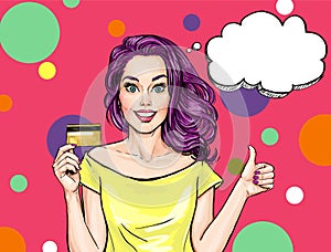 Smiling girl with bank card. Pop Art girl.Woman with banck card