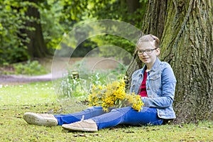 Smiling girl with big bouquet