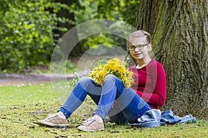 Smiling girl with big bouquet