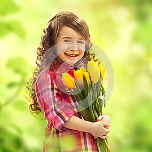 Smiling girl with big bouquet of flowers