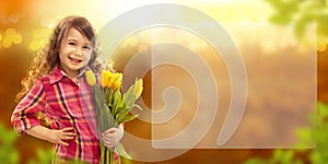 Smiling girl with big bouquet of flowers