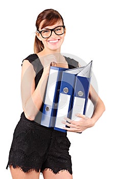 Smiling girl in big glasses holds three folders