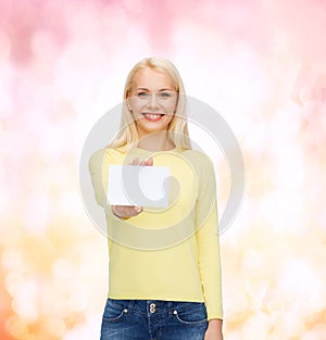 Smiling girl with blank business or name card