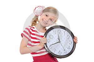 Smiling girl with clock