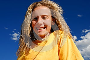 Smiling girl with crimped hair photo