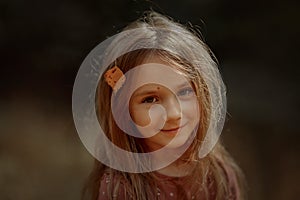 Smiling girl cutest autumn portrait with  leave