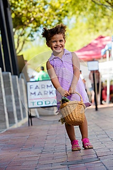 Smiling GIrl at Farmers Market