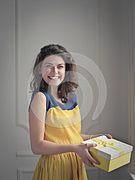 Smiling girl with a gift