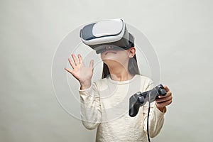 Smiling girl with glasses of virtual reality