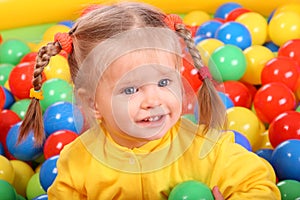 Smiling girl. Group of color ball back