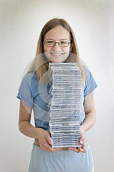 Smiling girl with her cds