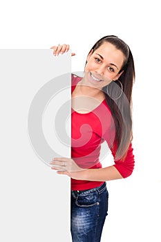 Smiling girl holding blank board