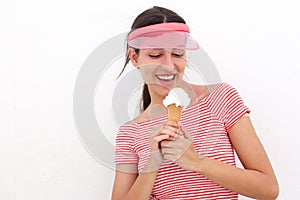 Smiling girl holding ice cream cone