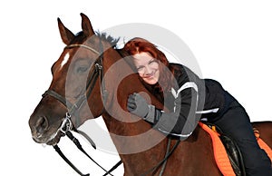 Smiling girl on a horseback