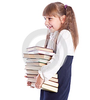 A smiling girl with a huge pile of books