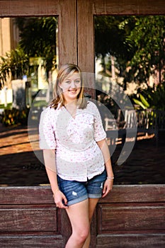 Smiling Girl infront of reflection