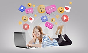 smiling girl with laptop and internet icons