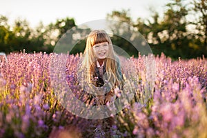 Smiling girl in a lavender field.