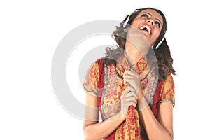 Smiling Girl listening music with head phones