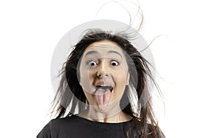 Smiling girl opening her mouth and showing the long big giant tongue isolated on white background, crazy and attracted