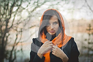 Smiling girl in orange hijab in Dubai Spring