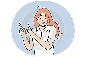 Smiling girl point up with fingers