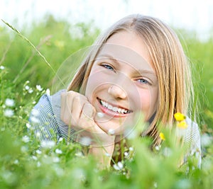 Smiling Girl Relaxing outdoors