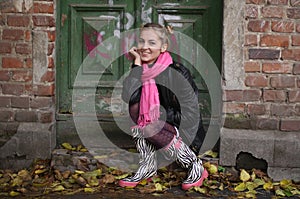 The smiling girl with a ridiculous hairdress photo