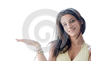 Smiling girl showing something on the palm