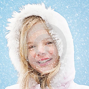 Smiling girl in snow