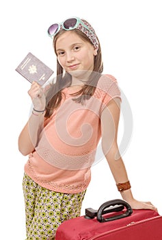 Smiling girl with travel bag, passport isolated over white