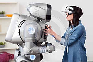 Smiling girl using virtual reality device