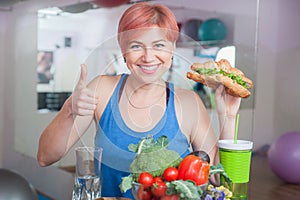 Smiling girl with vegan croissant, healthy lifestyle, weight loss