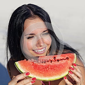 Smiling girl with water-melon