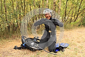 Smiling girl in wetsuit