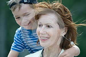 Smiling grandmother with grandson