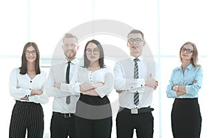 Smiling group of young professionals standing together