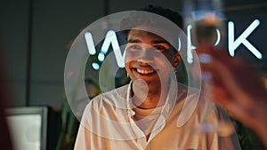 Smiling guy laughing at night bar closeup. African american man feeling happy