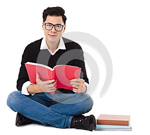 Smiling guy sitting on a floor