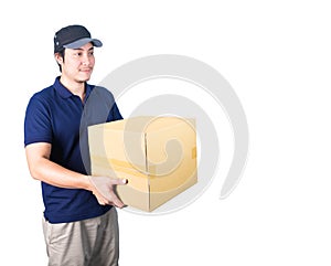 Smiling handsome asian delivery man giving and carrying parcel o