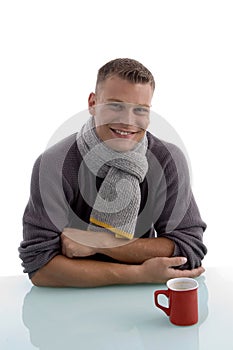 Smiling handsome man with coffee mug