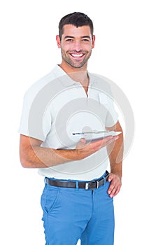 Smiling handyman with clipboard on white background