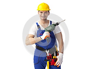 Smiling handyman holding drill machine