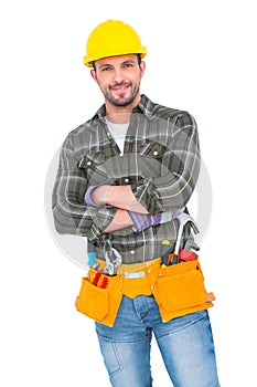 Smiling handyman wearing tool belt