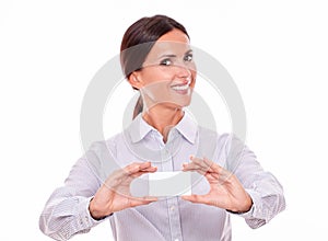 Smiling happy businesswoman with visit card