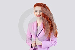 Smiling happy confident ginger woman looking at camera, expressing confidence and happiness.