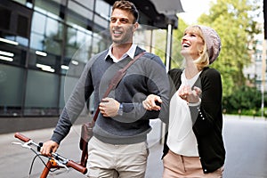 Smiling happy couple in love having fun together outdoors