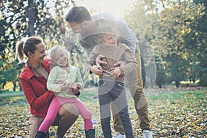 Smiling happy family spending time together. On the move.