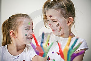 Smiling and happy little girls.